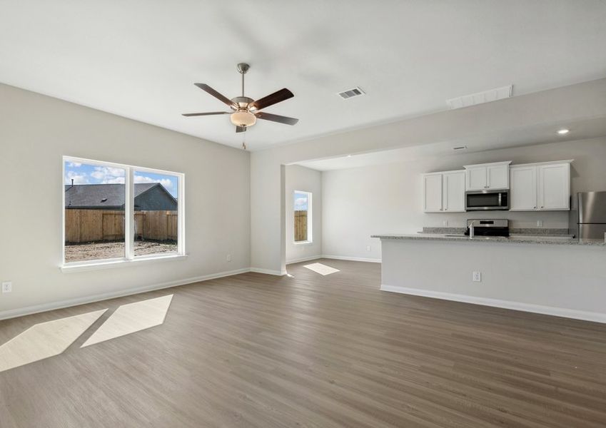 Vinyl flooring throughout the main living areas