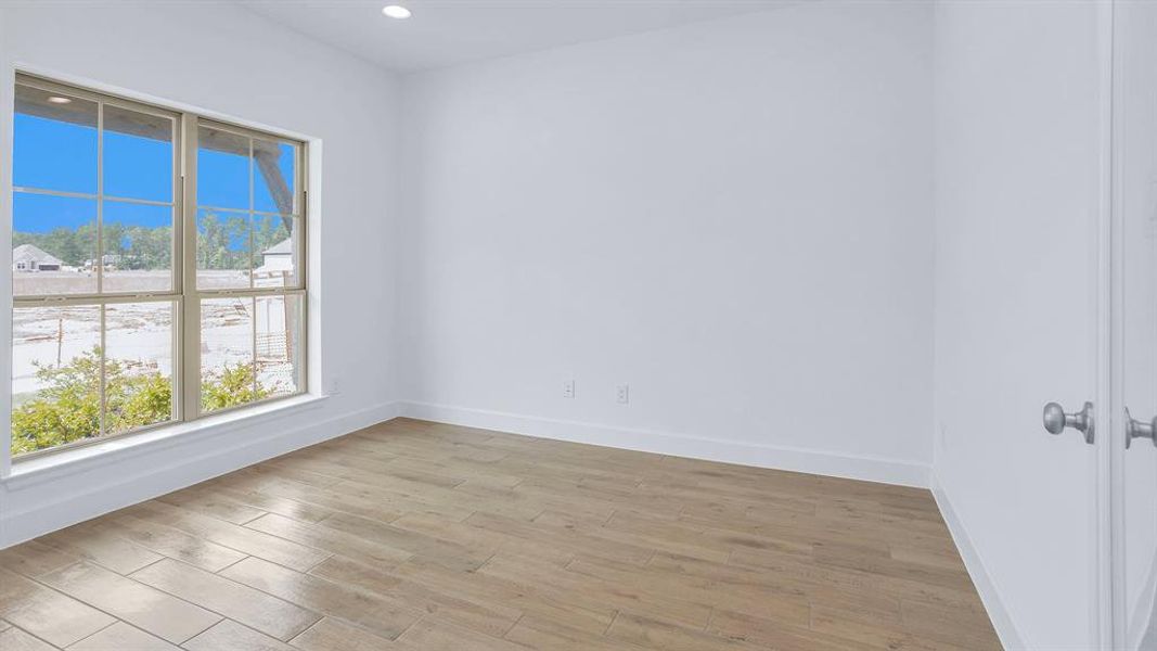 Spacious, unfurnished interior of a new home in Artavia 45', Conroe (Image 10).