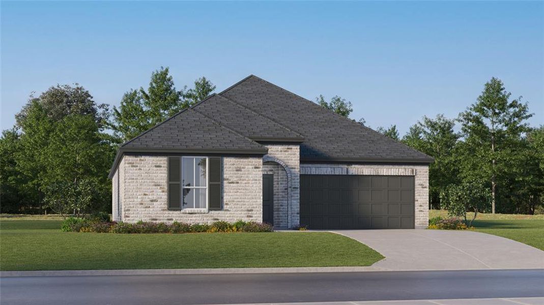 View of front facade featuring a garage and a front lawn