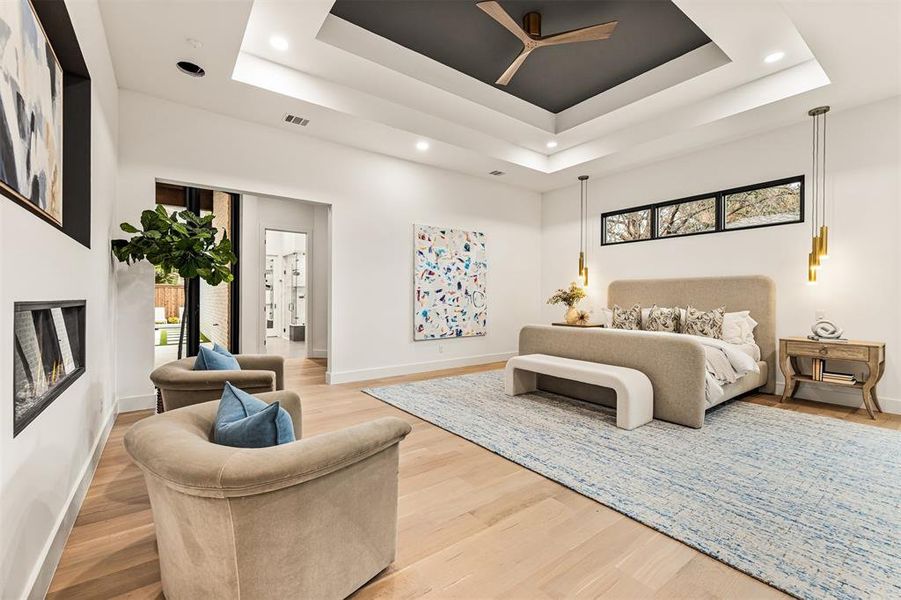 The primary bedroom is spacious and private, offering a calm retreat with room for a full bedroom setup