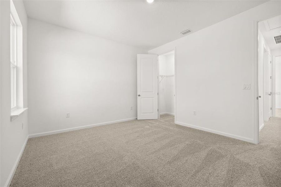 Spacious, unfurnished interior of a new home in Serenade at Ovation, Winter Garden (Image 25). Spacious, unfurnished interior of a new home in Serenade at Ovation, Winter Garden (Image 25).