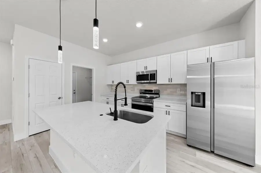 Furnished interior view inside a new home in , Ocala (Image 17).