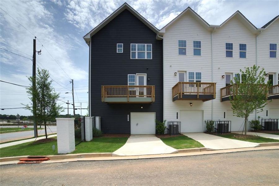 Front exterior of a new home in , Atlanta, GA, highlighting curb appeal (Image 1). Front exterior of a new home in , Atlanta, GA, highlighting curb appeal (Image 1).