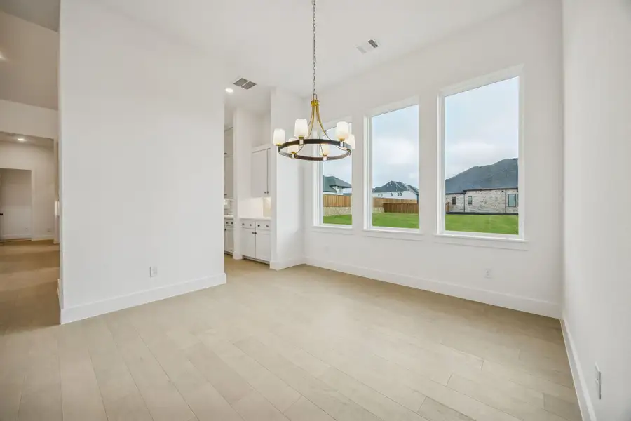 Representative unfurnished interior of a home built from the Connor by Southgate Homes in Eliana, McKinney (Image 15).