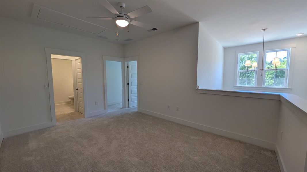 Spacious, unfurnished interior of a new home in Long Bay Golf Club, Longs (Image 31).