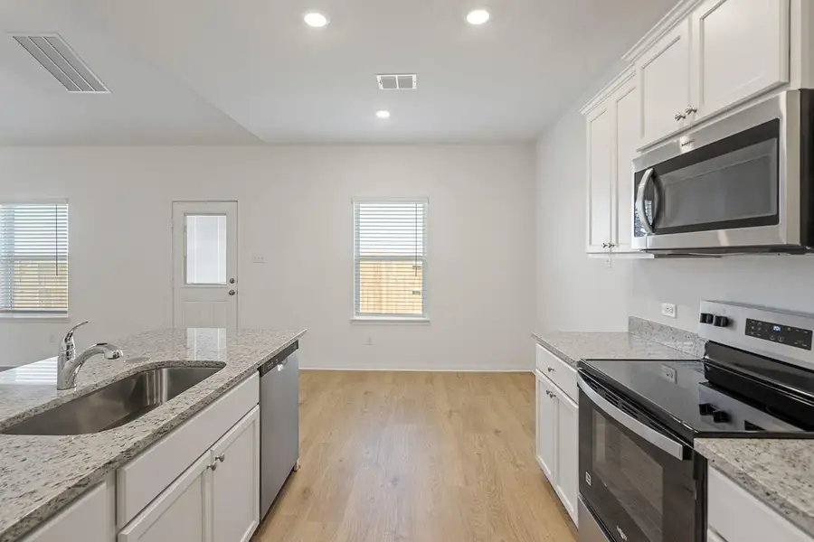 Furnished interior view inside a new home in Cypress Trails at Bauer Landing, Hockley (Image 3).