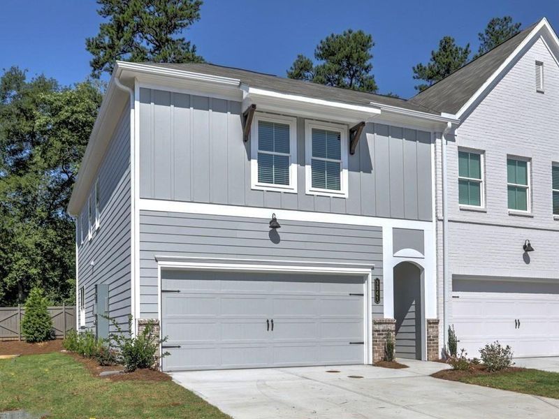 Front exterior of a new home in East Park Village, Kennesaw, GA, highlighting curb appeal (Image 2).