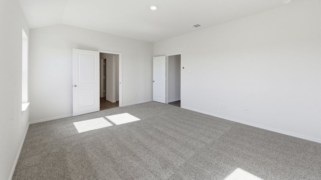 Representative unfurnished interior of a home built from the Learjet by D.R. Horton in Windrose, Pilot Point (Image 11).
