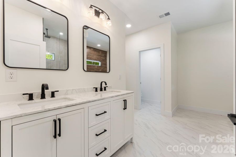 Furnished interior view inside a new home in , Huntersville (Image 13).