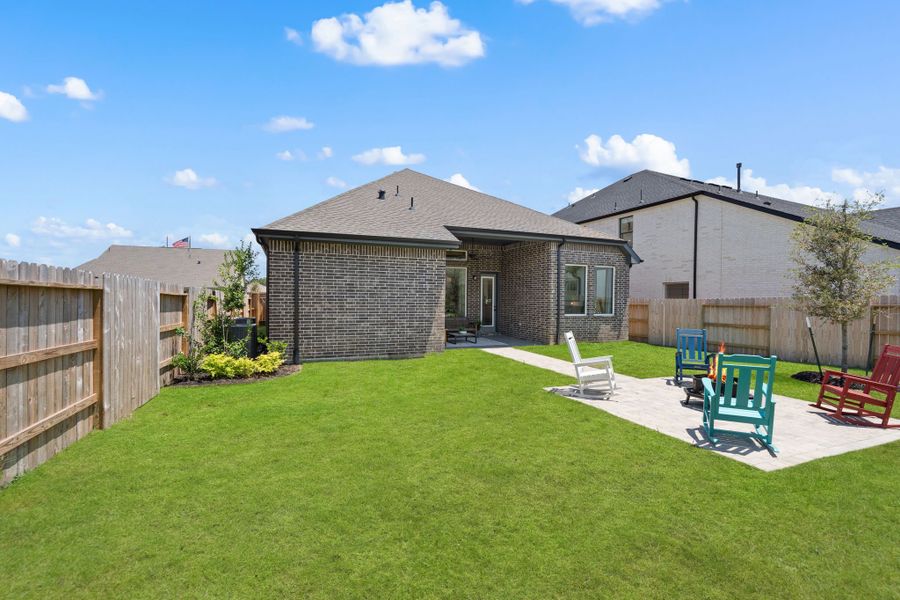 Exterior details and patio area of a home in Artavia, Conroe (Image 4).
