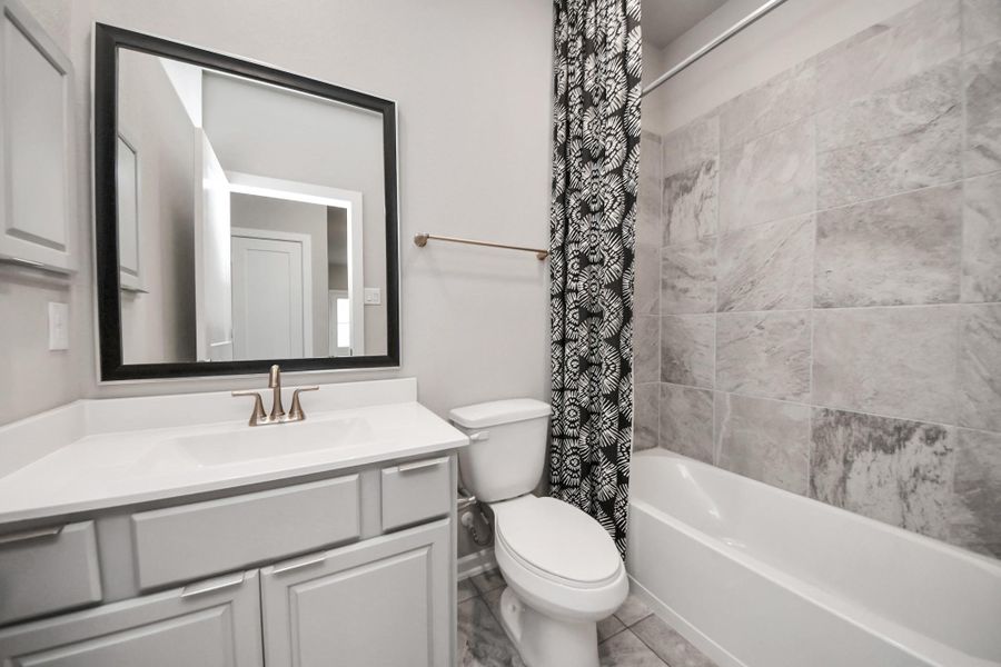 Furnished interior view inside a new home in The Groves, Humble (Image 10).