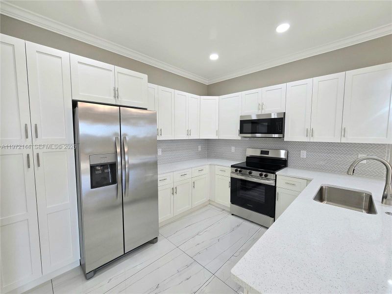 Furnished interior view inside a new home in , Lehigh Acres (Image 11).