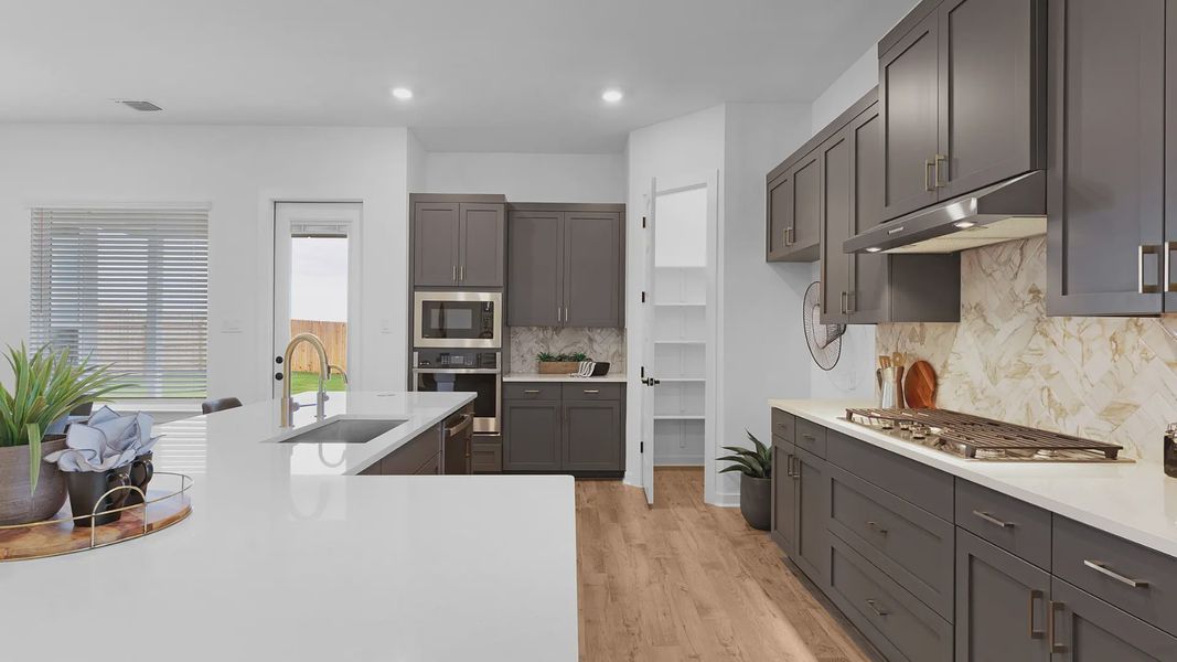 Furnished interior view inside a new home in The Grove at Blackhawk, Pflugerville (Image 11).