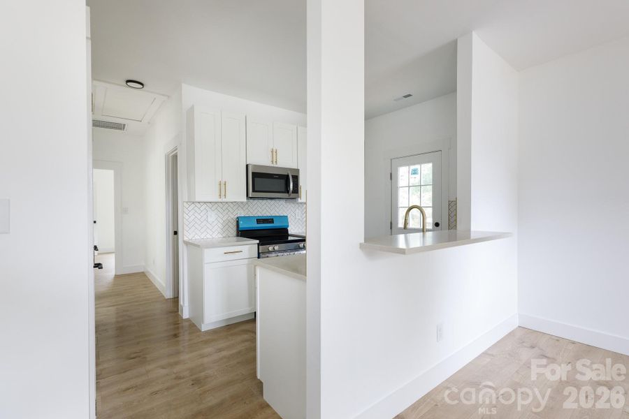 Furnished interior view inside a new home in , Great Falls (Image 3).