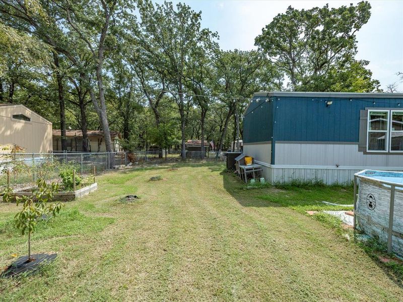 Front exterior of a new home in , Gun Barrel City, TX, highlighting curb appeal (Image 21). Front exterior of a new home in , Gun Barrel City, TX, highlighting curb appeal (Image 21).