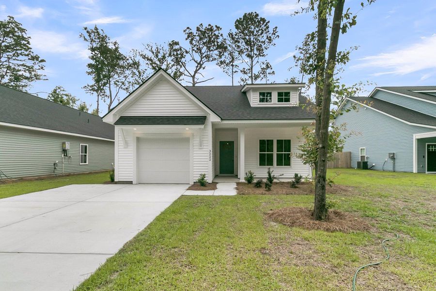 Front exterior of a new home in , Ladson, SC, highlighting curb appeal (Image 19).