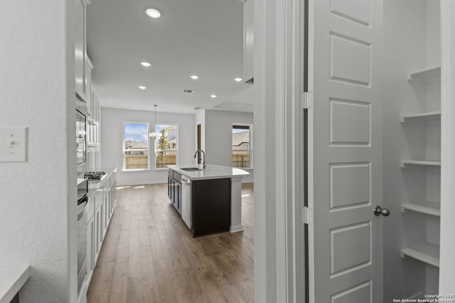 Furnished interior view inside a new home in Stillwater Ranch 60', San Antonio (Image 9).