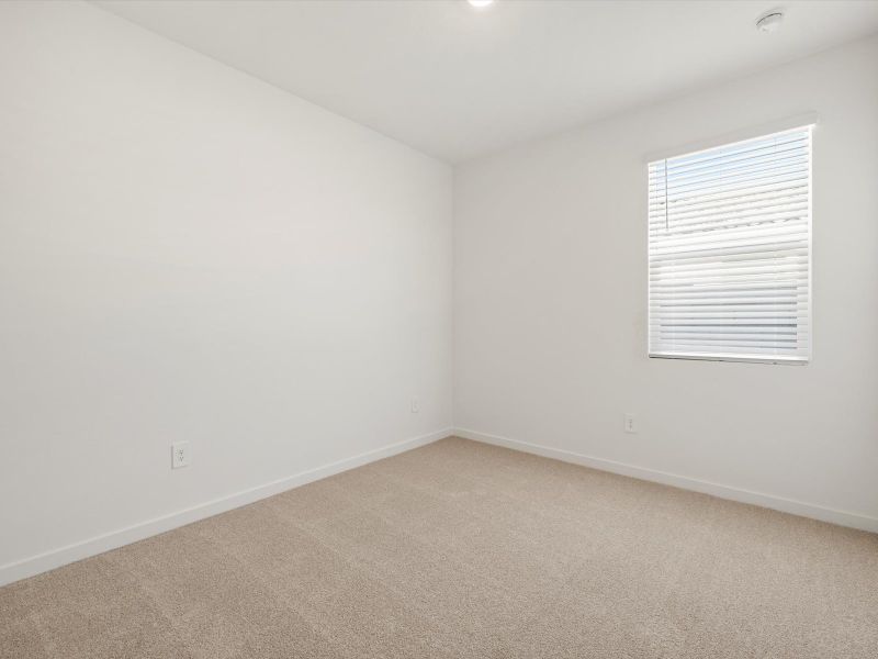 Spacious, unfurnished interior of a new home in Rancho Mirage Estate Series, Maricopa (Image 13).