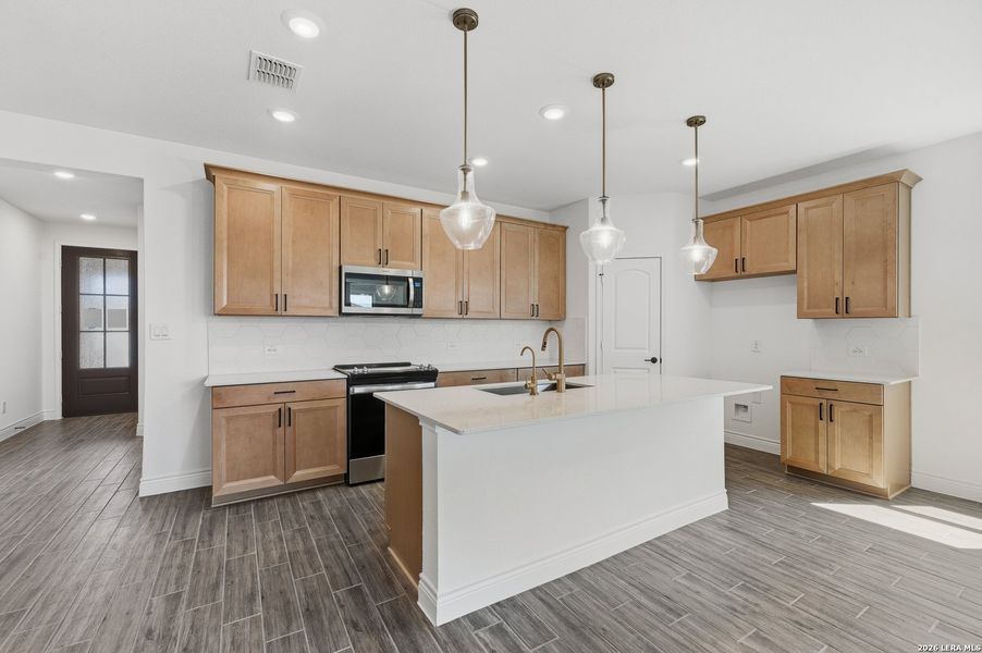 Furnished interior view inside a new home in Bison Ridge, San Antonio (Image 6).