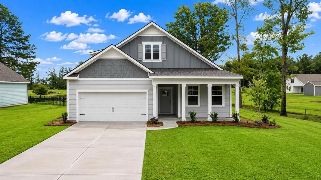 Front exterior of a new home in Lakeview at Kitfield, Moncks Corner, SC, highlighting curb appeal (Image 1). Front exterior of a new home in Lakeview at Kitfield, Moncks Corner, SC, highlighting curb appeal (Image 1).