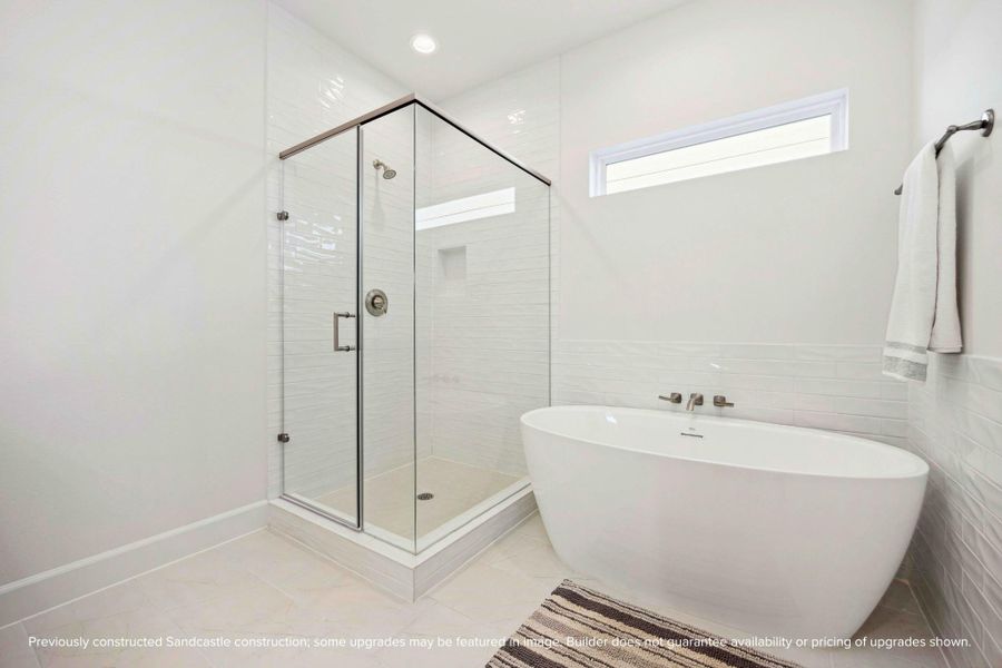 Steam it out or soak it in—this spa-like setup gives you both. Frameless glass, sculptural tub, and that “ahhh” factor. Steam it out or soak it in—this spa-like setup gives you both. Frameless glass, sculptural tub, and that “ahhh” factor.