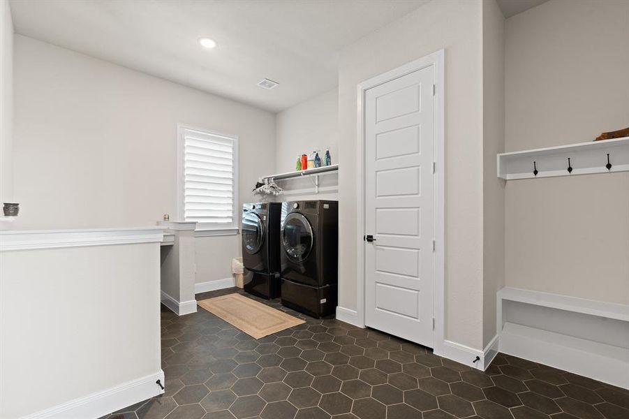 Furnished interior view inside a new home in Pecan Square - Estates, Northlake (Image 28).