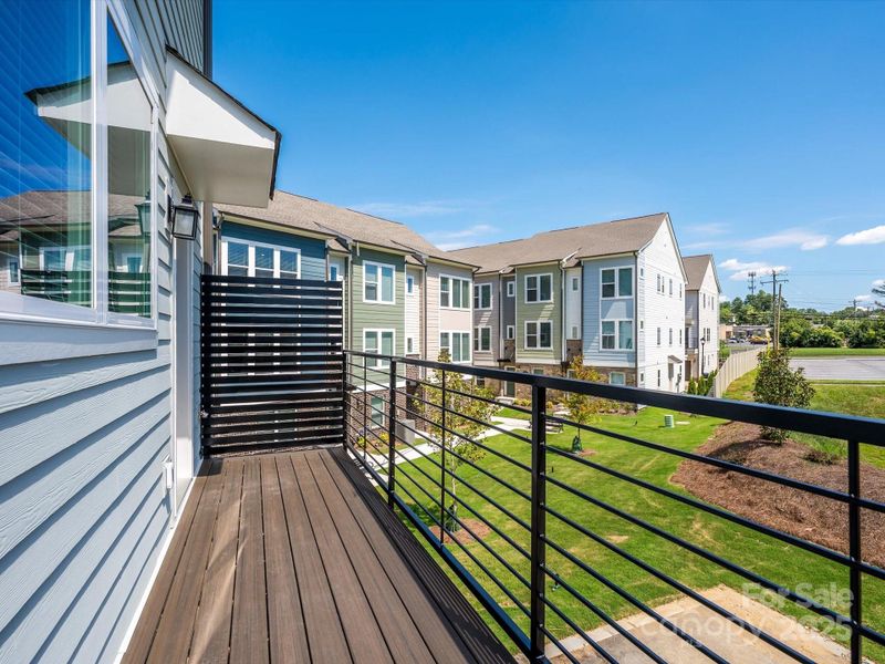 Front exterior of a new home in Central Living at Craig, Charlotte, NC, highlighting curb appeal (Image 22).