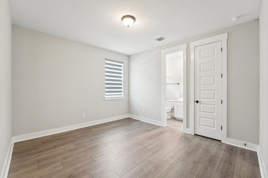 Bedroom on main floor with personal full bath Bedroom on main floor with personal full bath