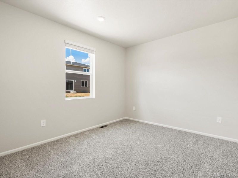 Spacious, unfurnished interior of a new home in Poudre Heights: The Alpine Collection, Windsor (Image 39).