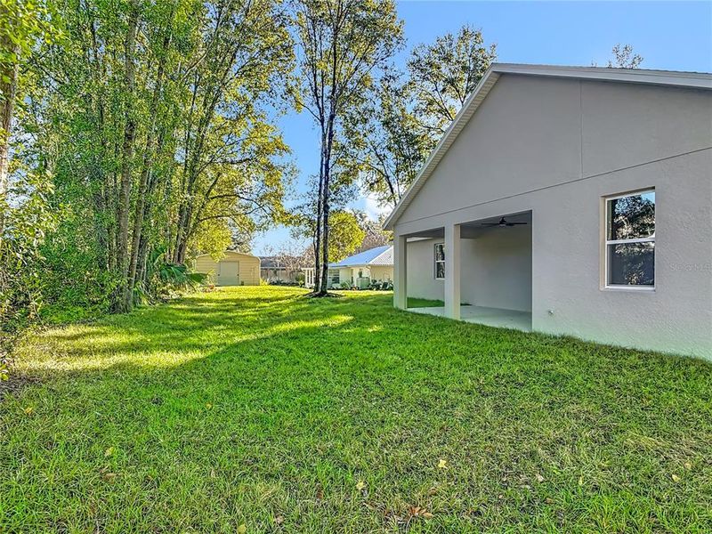 Exterior details and patio area of a home in , Lake Helen (Image 4). Exterior details and patio area of a home in , Lake Helen (Image 4).