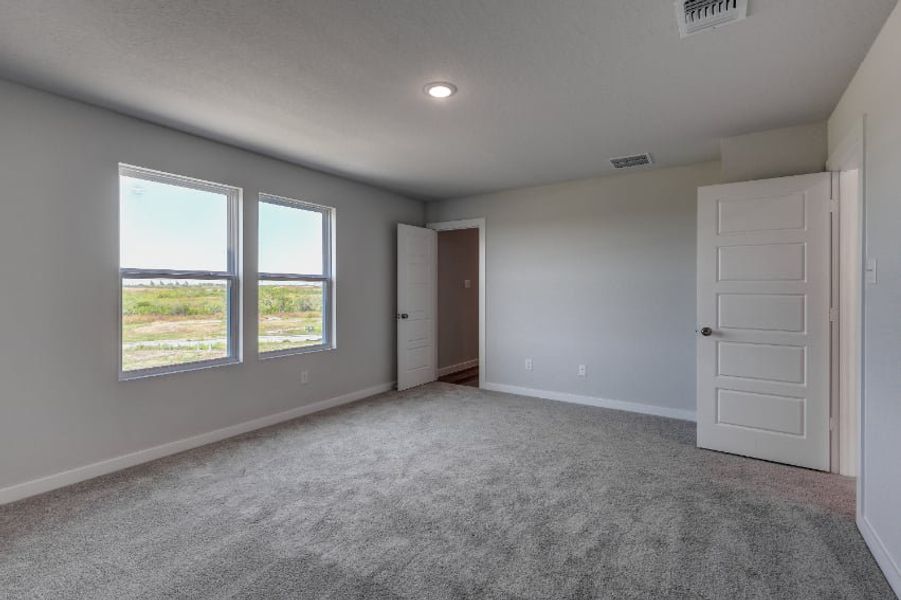 A room with white walls and windows. A room with white walls and windows.