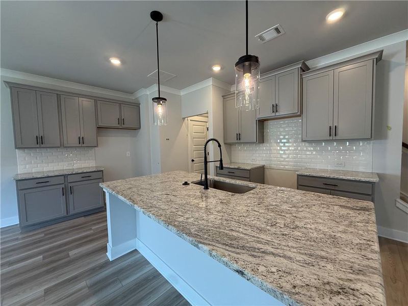 Furnished interior view inside a new home in The Towns at Auburn Station East, Auburn (Image 6).