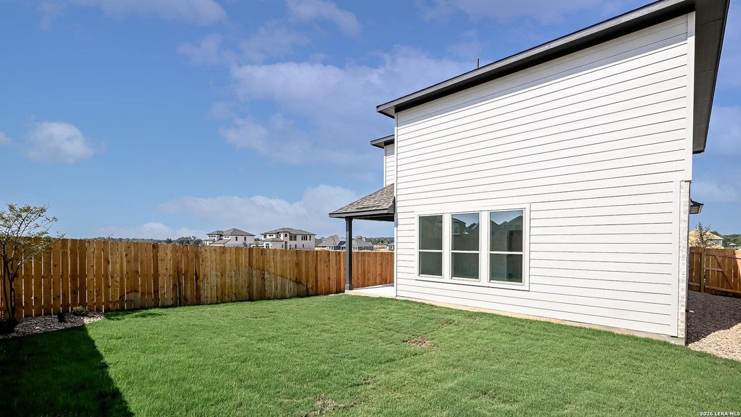 Exterior details and patio area of a home in Legacy at Lake Dunlap, New Braunfels (Image 22).