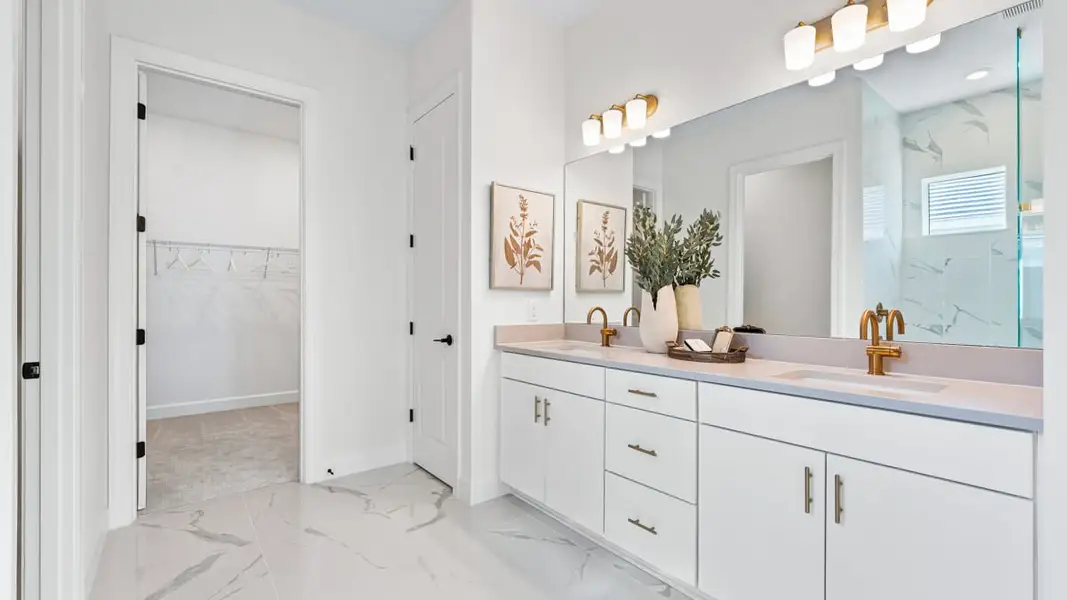 Furnished interior view inside a new home in Esplanade by the Islands, Naples (Image 6).