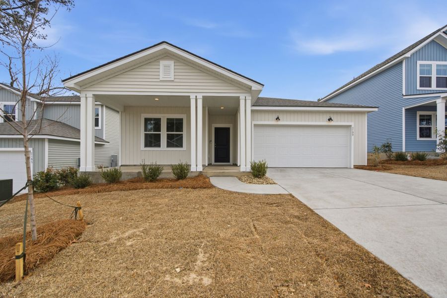 Front exterior of a new home in Grand Arbor, Blythewood, SC, highlighting curb appeal (Image 17).