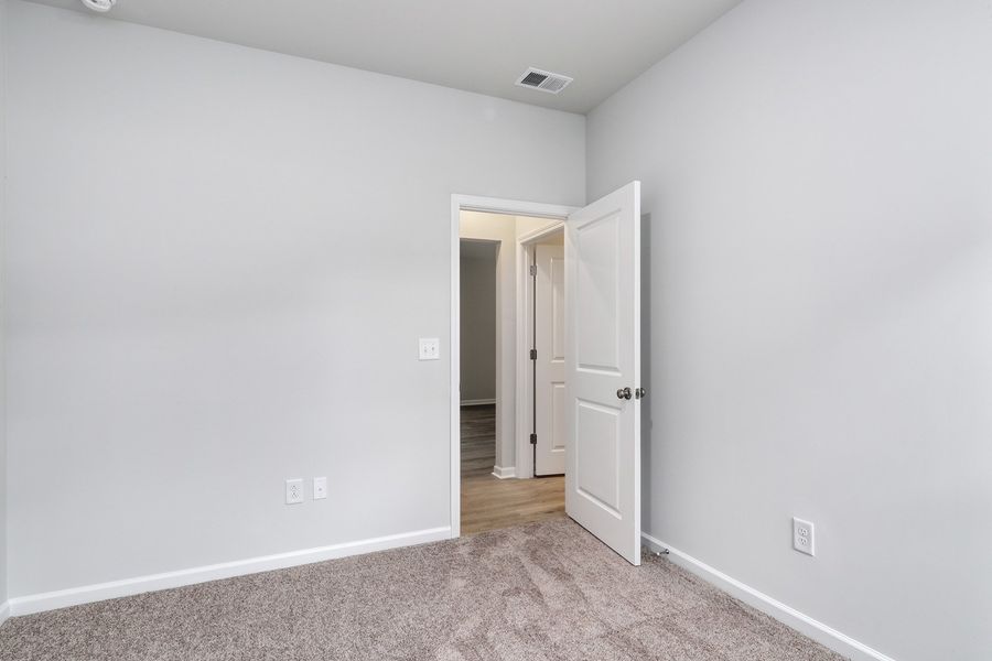 Spacious, unfurnished interior of a new home in Hainer Place, Conway (Image 27).