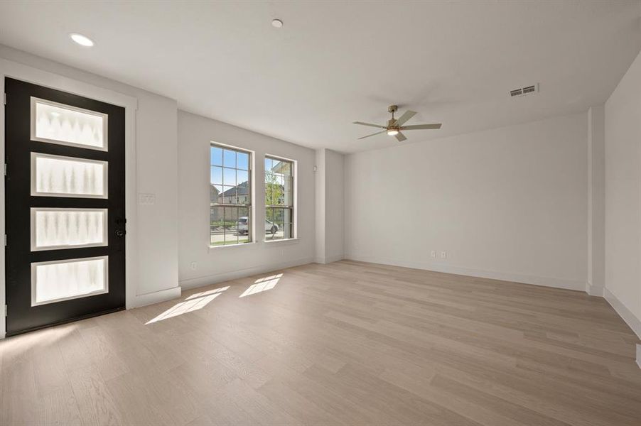 This spacious, light filled family room is the perfect place to host friends and family!