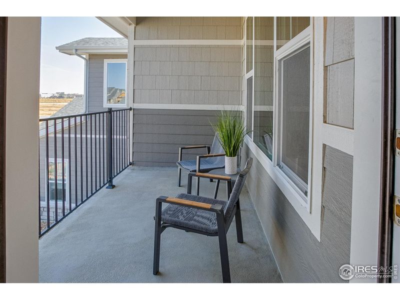 Exterior details and patio area of a home in The Lakes at Centerra - Discovery, Loveland (Image 3).