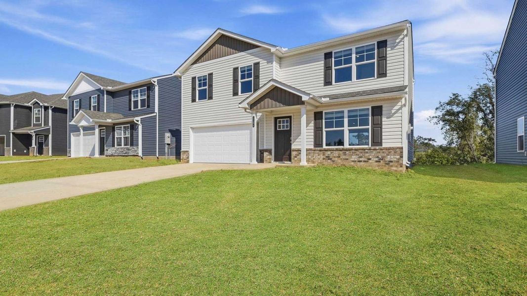 Front exterior of a new home in Johnson Farms, Greeneville, TN, highlighting curb appeal (Image 2).