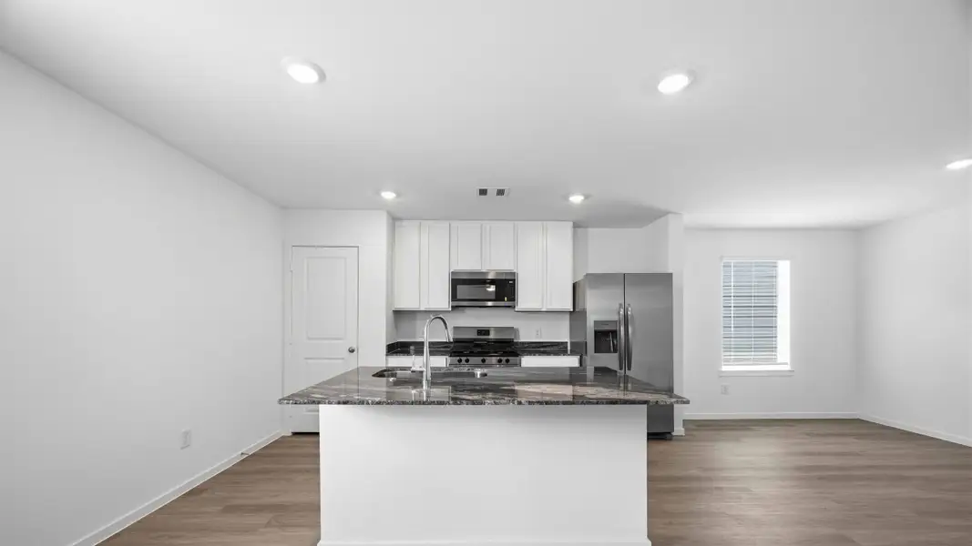 Furnished interior view inside a new home in Legacy Village, Houston (Image 4).
