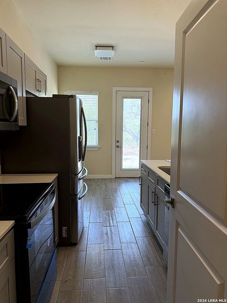 Furnished interior view inside a new home in , San Antonio (Image 10).