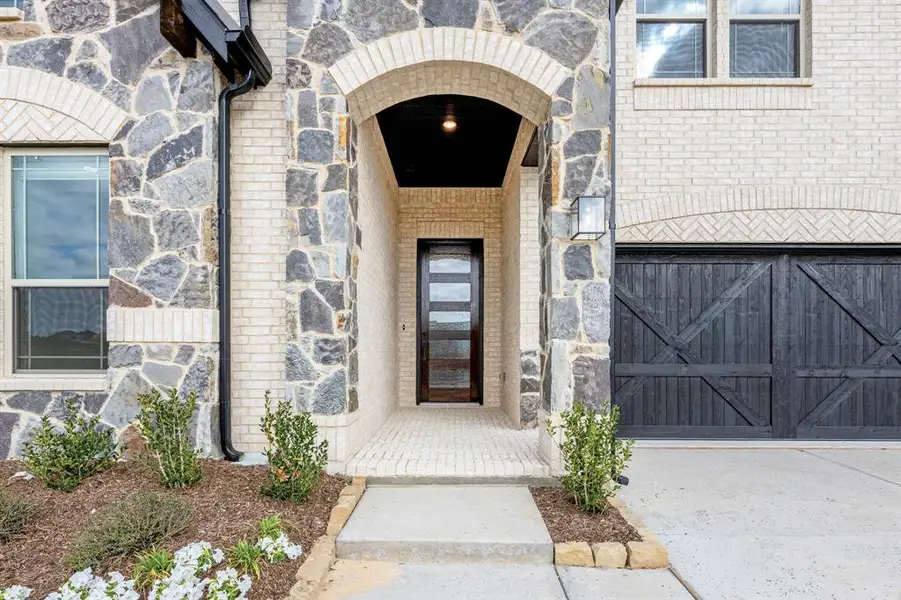 Exterior details and patio area of a home in Devonshire, Forney (Image 3).