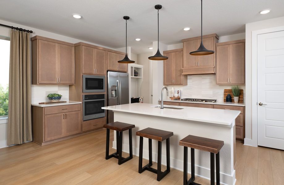 Representative furnished interior of a home built from the Sorrel by Tri Pointe Homes in Painted Tree, McKinney (Image 9).