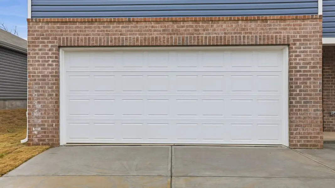 Exterior details and patio area of a home in Lakestone, Woodruff (Image 4).