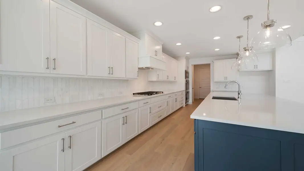 Representative furnished interior of a home built from the 3978W by Perry Homes in Austin Point, Richmond (Image 4).