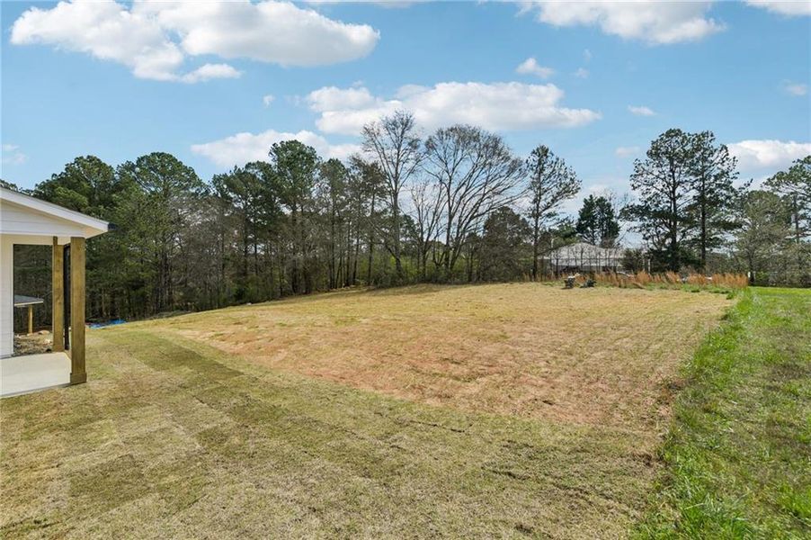 Exterior details and patio area of a home in , Loganville (Image 28).