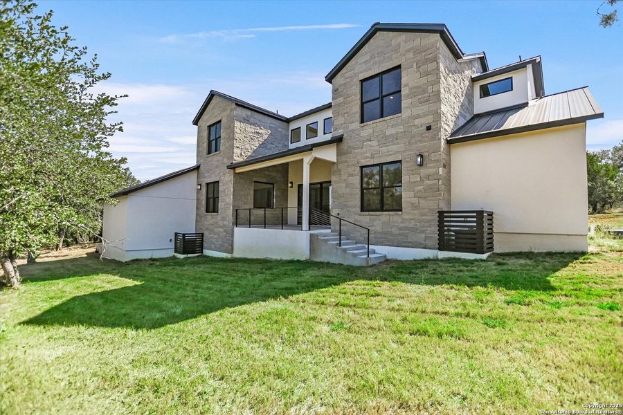 Exterior details and patio area of a home in , Horseshoe Bay (Image 24).