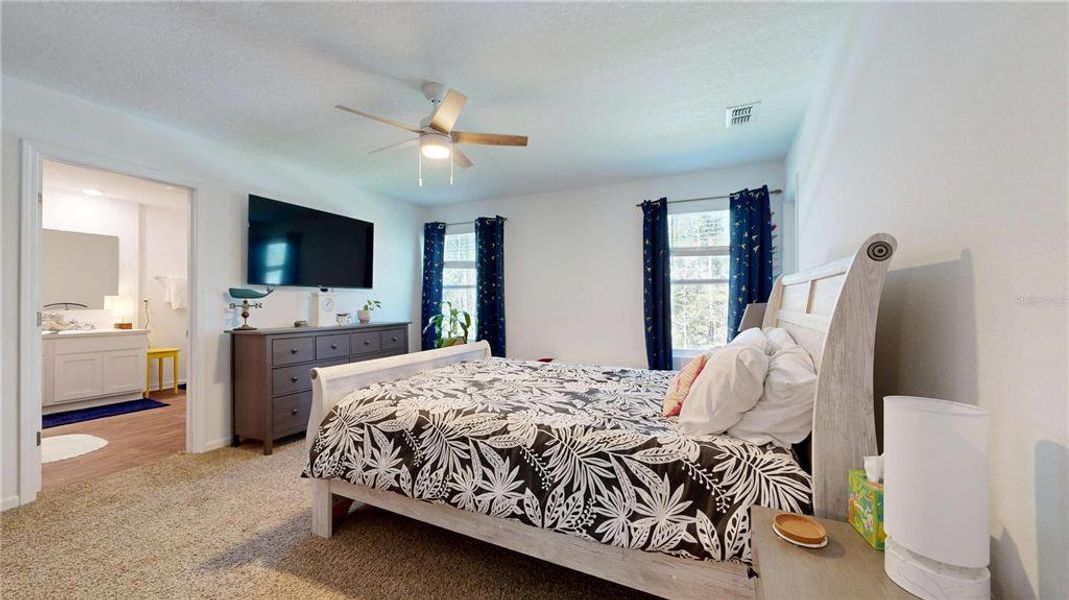 Furnished interior view inside a new home in Sawmill Branch Express, Palm Coast (Image 39).