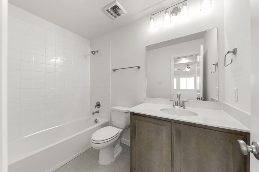 Furnished interior view inside a new home in The Reserve at Spiritas Ranch, Little Elm (Image 14).