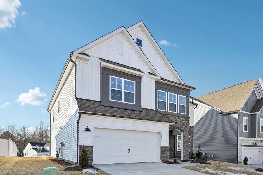 Exterior  - Earthy and warm tones feel rooted in place.